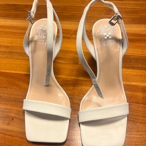 Size 9, white Vince Camuto heels. Worn two times.